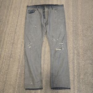 Art Meets Chaos Attica distressed  Short rise slim tapered leg jeans.